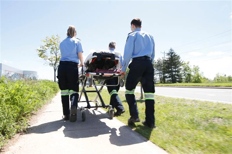 Experience at Oulton College our Primary Care Paramedic Program. Image has Oulton College Primary Care Paramedic Student in a real life scenario Lab, students are completing a practical lab during a lesson.