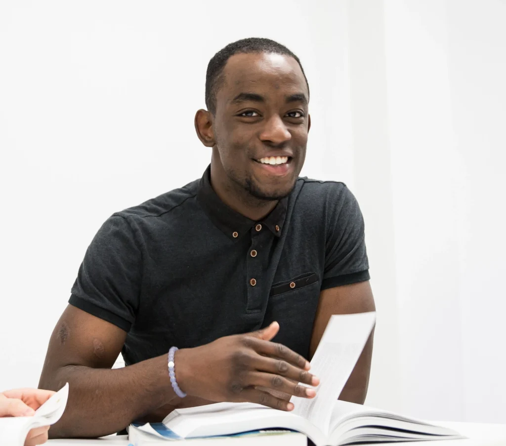 Business administration students at Oulton College. A Business administration and Business management student in a class session, as part of their Associates Degree in Business Administration.
