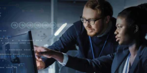 systems management and cybersecurity analysts assessing a problem.