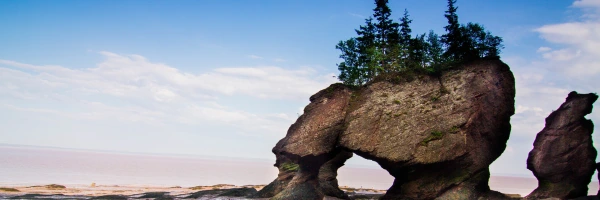 A landscape of Hopewell Rocks that is a famous landmark and found in New Brunswick.